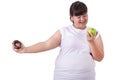 Fat asian woman wearing white t-shirt and choosing to eat green Royalty Free Stock Photo