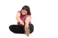 Fat Asian women exercise stretching muscles.