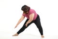 Fat Asian women exercise stretching muscles.