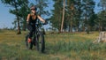 Fat bike also called fatbike or fat-tire bike in summer riding in the forest. Royalty Free Stock Photo