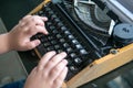 Fat Boy hands writing on old typewriter Royalty Free Stock Photo