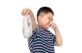 Fat boy holding dirty stinky socks isolated Royalty Free Stock Photo