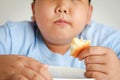 The Fat Boy is overweight. Eat pizza. Royalty Free Stock Photo