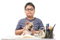 Fat boy playing cute little French bulldog on table