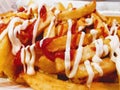 Fat chips with mayonnaise and ketchup Royalty Free Stock Photo