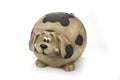 Fat decoration ceramic dog on a white Royalty Free Stock Photo