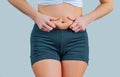 Fat female belly. Getting rid of belly fat and weight los Royalty Free Stock Photo