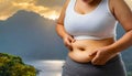 Fat female belly, woman holding her skin for cellulite check. Getting rid of belly fat Royalty Free Stock Photo