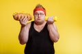 Fat man choise between sport and fastfood Royalty Free Stock Photo