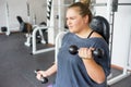 Fat girl in a gym Royalty Free Stock Photo