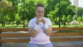 Fat girl struggles with temptation to eat burger, prefer junk food, no willpower