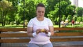 Fat girl struggles with temptation to eat burger, prefer junk food, no willpower