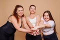 Fat girls teamed up to lose weight. Cheerful overweight friends Royalty Free Stock Photo