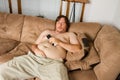 Fat guy sleeping on the couch Royalty Free Stock Photo