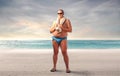 Fat man at the beach Royalty Free Stock Photo