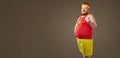 A fat man with a beard in a tracksuit. Royalty Free Stock Photo