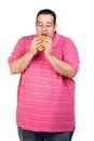 Fat man eating a hamburger Royalty Free Stock Photo