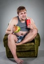 Fat man eating hamburger Royalty Free Stock Photo