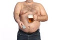 Fat man holding beer, chips and tv remote Royalty Free Stock Photo