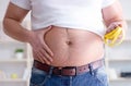 Fat obese man in dieting concept Royalty Free Stock Photo