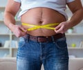 Fat obese man in dieting concept Royalty Free Stock Photo