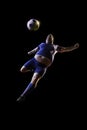 Fat soccer player in action. stadium in