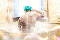 Fat ugly man washing in a bath Royalty Free Stock Photo