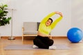 Chubby woman exercises at home for health and fitness Royalty Free Stock Photo