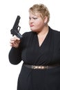 Fat woman with a gun. Royalty Free Stock Photo