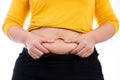 Fat woman holding excessive fat belly, overweight fatty belly isolated white background. Diet lifestyle, weight loss, stomach Royalty Free Stock Photo