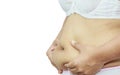 Fat woman pinching her fat tummy Royalty Free Stock Photo