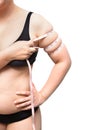 Fat woman show squeeze tighten arm body fat by measure tape weight loss concept Royalty Free Stock Photo