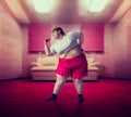 Fat woman on training, fight against obesity Royalty Free Stock Photo