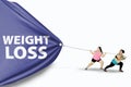 Fat women pulling Weight Loss text Royalty Free Stock Photo
