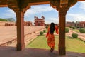 Fatehpur Sikri medieval architectural ruins with woman tourist at Agra India Royalty Free Stock Photo