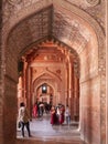 FATEPHUR SIKRI, INDIA- MARCH, 27, 2019: visitors looking west inside the buland darwaza gate