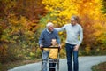 Father adult son and grandson out for a walk in the park Royalty Free Stock Photo