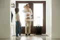 Father arrived came home returning after trip holding hugging da Royalty Free Stock Photo