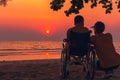 Father and Asian special child on wheelchair happy holiday time on sea beach at sunset Royalty Free Stock Photo