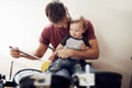 Father, baby and child drum lesson with music development and learning. Home, dad and papa bonding with youth smile and