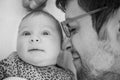 Father with baby girl close-up in black and white - Monochrome family togetherness concept - Father and daughter love monochrome - Royalty Free Stock Photo