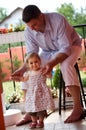 Father and baby girl in garden Royalty Free Stock Photo