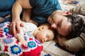 Father with a baby girl at home sleeping. Royalty Free Stock Photo