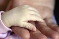 Father and baby hand