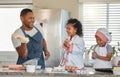 Achieving success in baking teaches kids to be confident in their creative abilities. a father baking at home with his