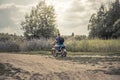 Father biker son riding motorcycle countryside road concept road trip Royalty Free Stock Photo