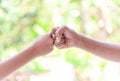 Father and boy hands - Fist bump