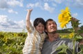 The father and boy with sunflower Royalty Free Stock Photo