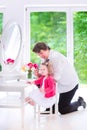 Father brushing hair of his adorable daughter Royalty Free Stock Photo