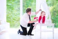 Father brushing hair of his little daughter Royalty Free Stock Photo